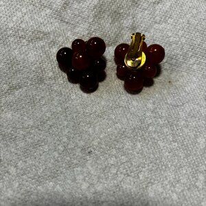 Carnegie clip earrings orange marbled Lucite bead clusters